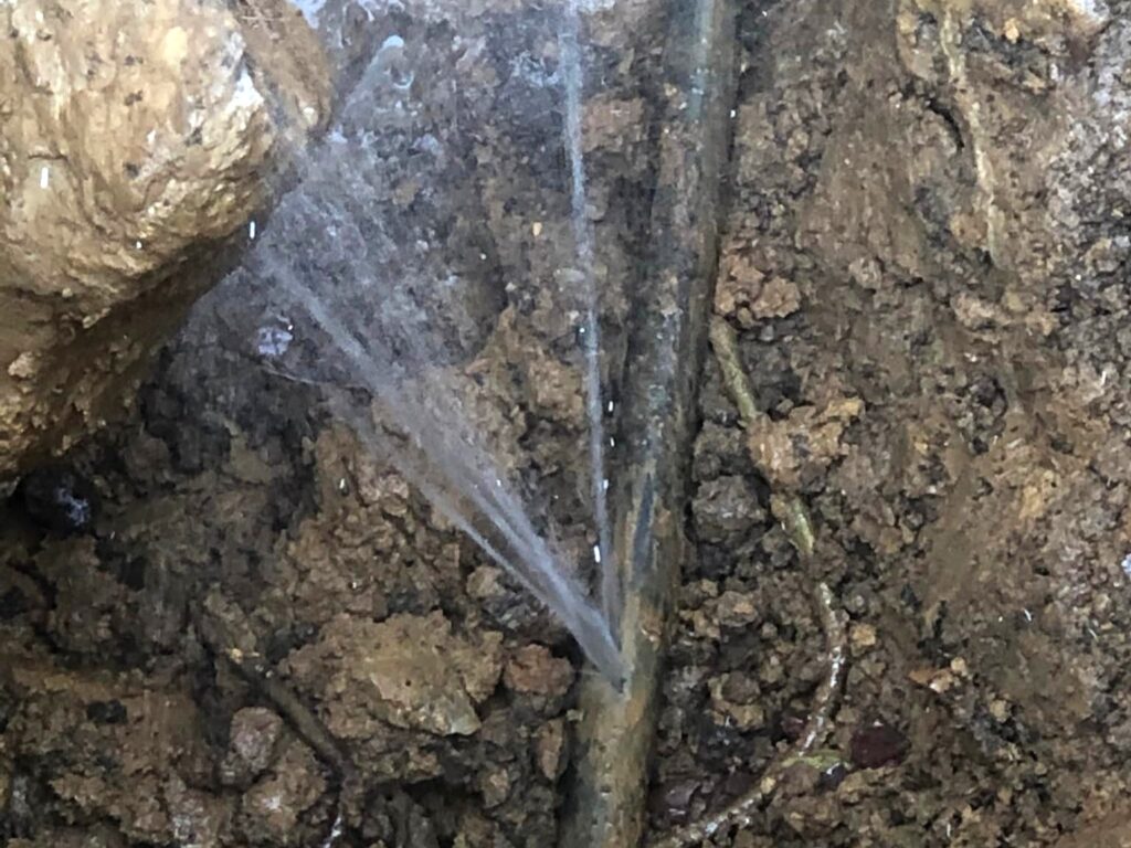Searching for a plumber near me due to a broken water pipe.